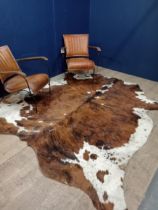 Cowhide rug. { 230cm W X 207cm D }.