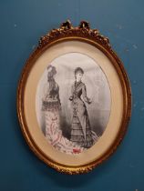 Coloured print Two Ladies monted in a decorative oval frame. { 58cm H X 43cm W }.