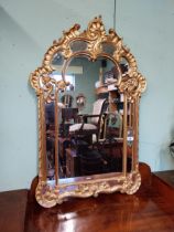 Good quality decorative 20th. C. gilt wall mirror in the Italian style. { 117cm H X 76cm W }.