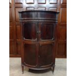 Edwardian mahogany cabinet gramophone, raised on turned legs with casters. { 122cm H X 66cm W X 60cm