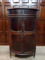 Edwardian mahogany cabinet gramophone, raised on turned legs with casters. { 122cm H X 66cm W X 60cm