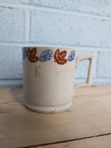 2nd Period Belleek spongeware mug decorated with flowers & foliage Black stamp. { 10cm H X 13cm W }.