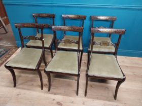 Set of six Regency rosewood and brass inlay dining room chairs with upholstered seats. {83 cm H x 46