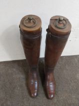 Pair of leather riding boots {50 cm H x 7 cm W x 27 cm D}.