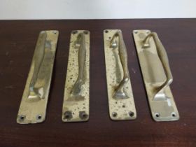 Set of four brass door handles {30 cm H x 6 cm W x 7 cm D }.