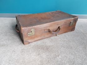 Early 20th C. leather suitcase. { cm H cm W cm D}.