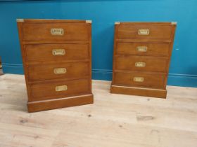 Pair of exceptional quality mahogany campaign style cabinets with brass mounts, each with four