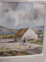 P M Logue - Feeding the Hens in Connemara - Watercolour mounted in a gilt frame . {56 cm H x 45 cm