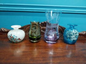 Four pieces of end of day and coloured glas vases.