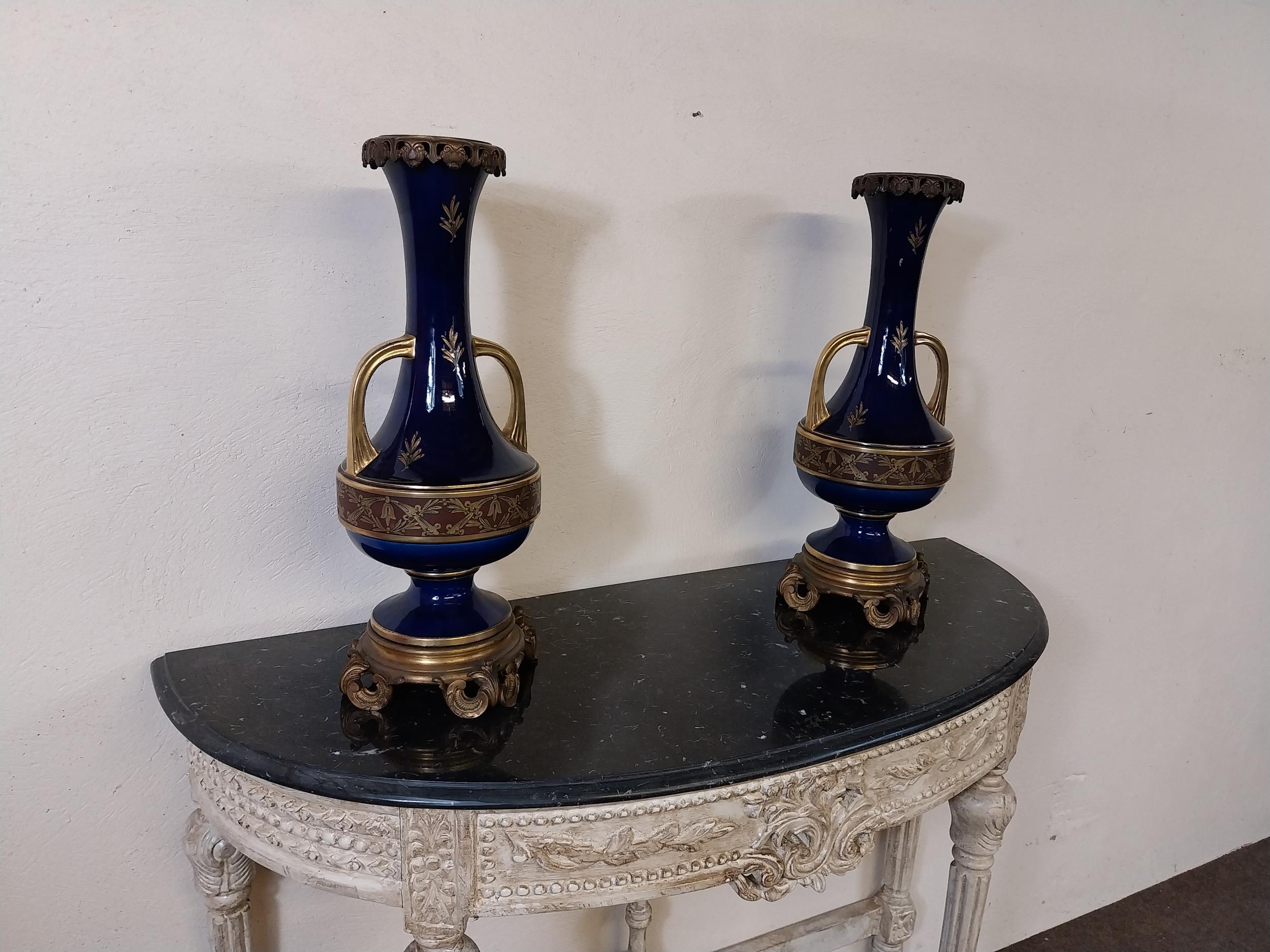 Pair of 19th C. ceramic and gilded bronze vases signed {50 cm H x 22 cm Dia.}.