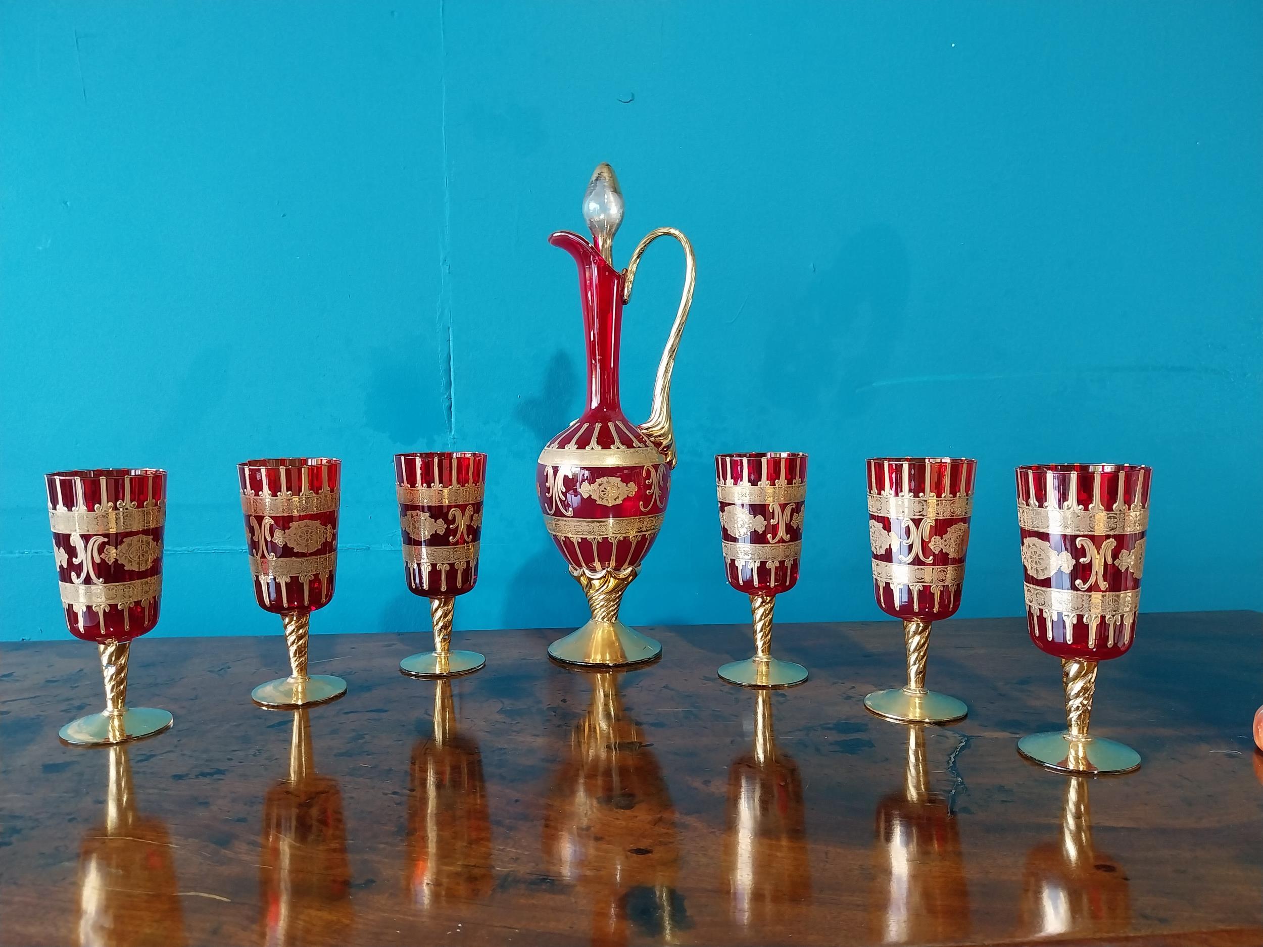 Early 20th C. Ruby glass and gilt decanter with six matching glasses {42 cm H x 15 cm Dia. And 18 cm