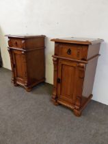 Pair of stained pine bedside lockers with single drawer over blind door {74 cm H x 40 cm W x 38 cm