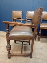 Set of four + two oak framed chairs with leather upholstery and antique studding. { Chairs 88cm H