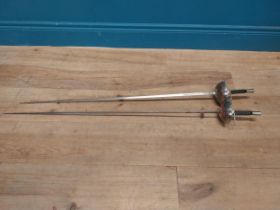 Pair of fencing swords {109 cm L}.