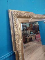 19th C. decorative gilt wall mirror {157 cm H x 130 cm W}.