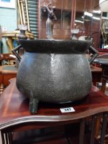 Unusual bronze three legged pot {22 cm H x 34 cm W x 30 cm D}.