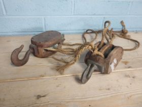 Pair of early 20th. C. Pine & metal pulleys { 36cm H X 14cm W X 9cm D }.