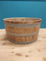 Early 20th C. oak and metal bound log bucket {44 cm H x 84 cm Dia.}.