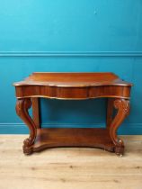 Victorian mahogany side table raised on carved legs and platform base {79 cm H x 108 cm W x 50 cm