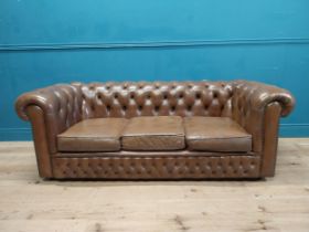 Good quality leather deep buttoned Chesterfield three seater sofa {70 cm H x 190 cm W x 87 cm D}.