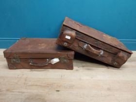 Two early 20th C. leather suitcases. {20 cm H x 62 cm W x 40 cm D} approx.
