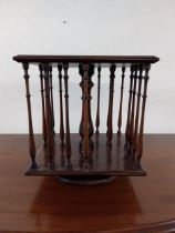 Edwardian mahogany table top revolving book case {34 cm H x 30 cm W x 30 cm D}.