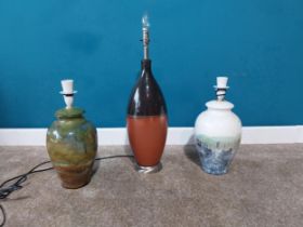 Three studio pottery table lamps {64 cm H and 40 cm H}.{ cm H cm W cm D}.