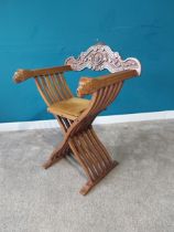 Carved walnut x-framed Throne chair decorated with lion's masks. {86 cm H x62 cm W x 54 cm D}.{ cm H