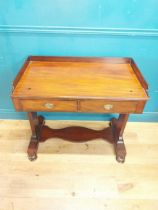 William IV mahogany side table with two drawers in the frieze raised on platform base {80 cm H x