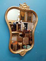 Gilt and carved wall mirror in the Victorian style. {69 cm H x 47 cm W}