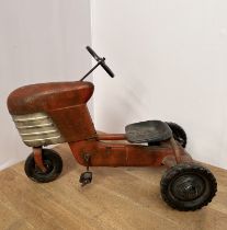 Vintage metal child's pedal tractor. { 72cm H X 96cm W X 52cm D }.