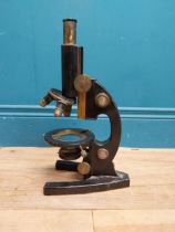 Early 20th C. brass and metal microscope. {36 cm H x 14 cm W x 20 cm D}.