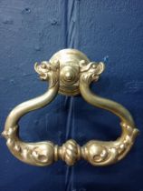 19th. C. brass door knocker, the handle in the form of twin dragons. { 12cm H X 14cm W X 6cm D }.