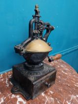 Early 20th C. cast iron coffee grinder. {36 cm H x 36 cm W x 23 cm D}.