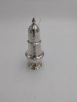 Irish Georgian silver sugar sifter/ shaker of classical baluster shape, the dome top of push fit and