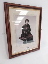Framed black and white print of Constance Markievicz and her Dog. {60 cm H x 49 cm W}