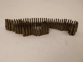 Brass rifle bullet belt. {71 cm L}.