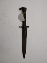 20th C. rifle bayonet with original metal scabbard. {36 cm L}.