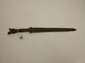 Unusual bronze Oriental dagger with dragon head hilt.{54 cm L x 5 cm W}.