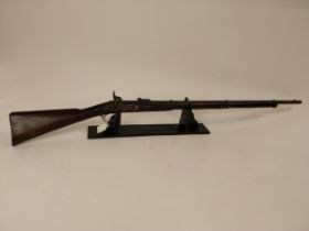19th C. percussion capped military long barrelled rifle. {149 cm L}.