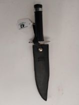 Rambo First Blood Part 1 Dagger with serrated edge with leather scabbard.