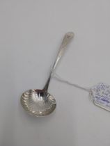 Irish Georgian silver sauce ladle with bright cut Celtic point decoration, the cartouche engraved