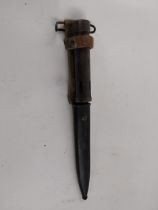 20th C. rifle bayonet with original metal scabbard. {23 cm L}.