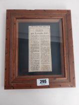Framed newspaper cutting The Sunday Press April 9th 1950 300 barrracks burn. {33 cm H x 28 cm W}.