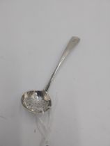 Irish Georgian silver spice sifter spoon with Old English pattern, engraved with a cross crosslet