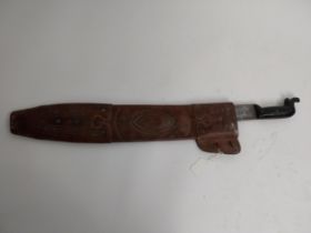 African knife in Scabbard. {70 cm L}.