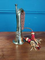 Brass bugle {27 cm H x 10 cm W x 16 cm D}.