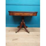 Regency mahogany TOL card table raised on single column with four outswept feet. {73 cm H x 91 cm