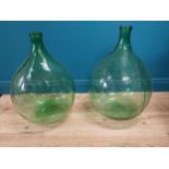 Pair of 19th C. green carboy glass bottles. {70 cm H x 43 cm Dia.}.