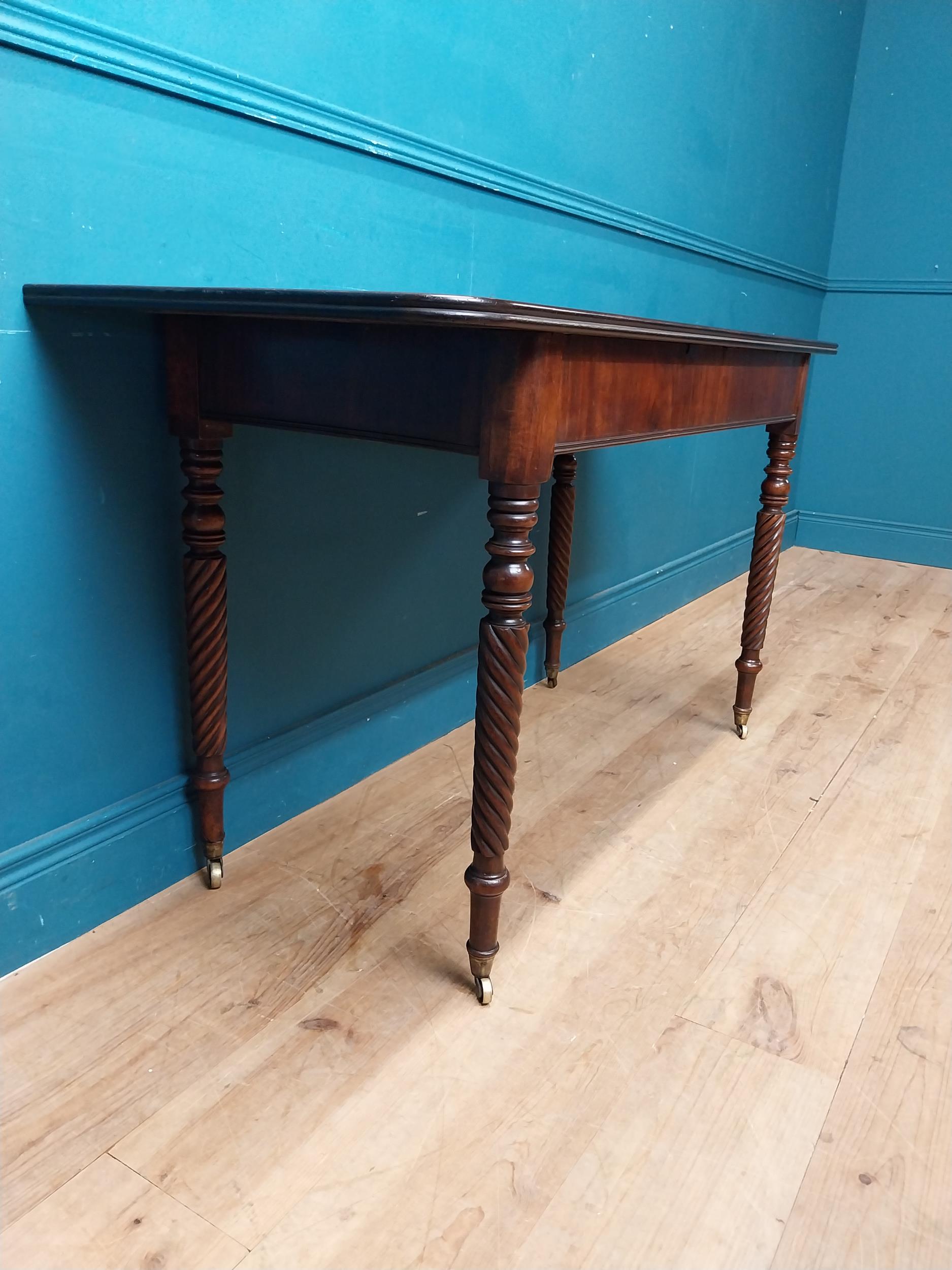 Regency mahogany side table raised on four turned legs. {74 cm H x 132 cm W x 52 cm W}. - Image 3 of 4